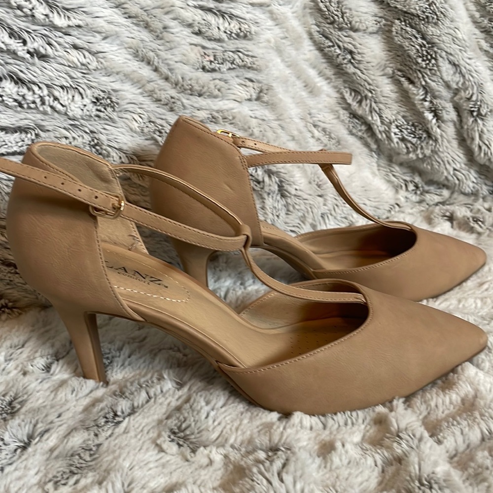 Comfortable fitting nude strapped heels